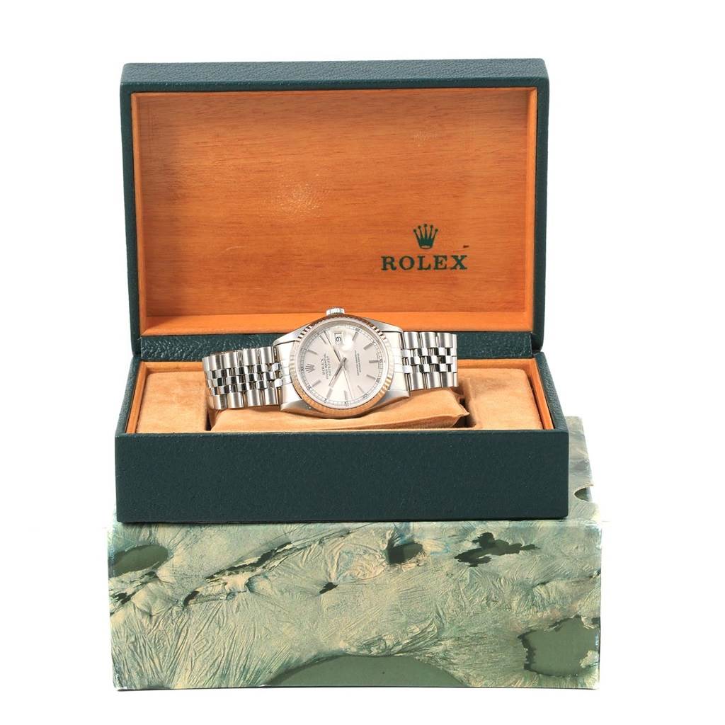 The Rolex Datejust 16234 Men's Stainless Steel Silver Dial 16234 Men's Stainless Steel Silver Dial watch is displayed frontally inside its open box.