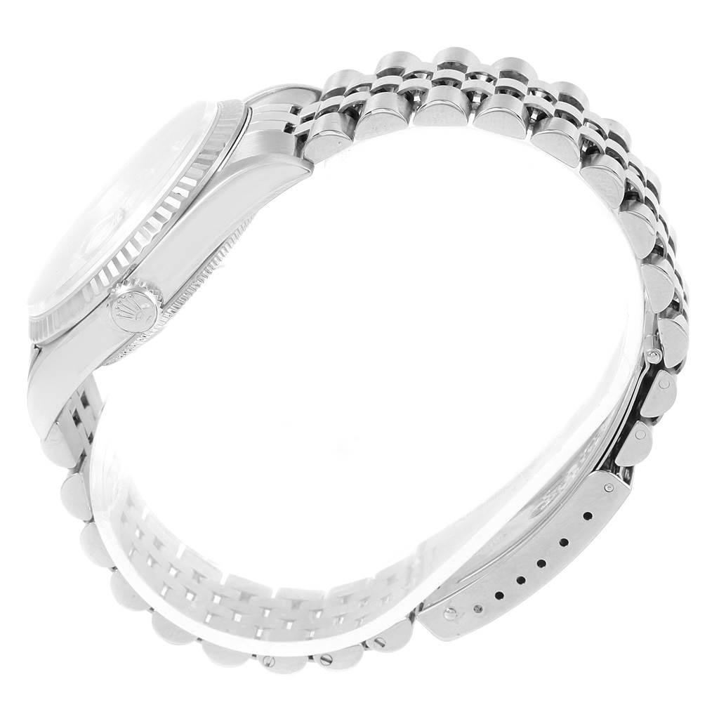 This image shows a side view of the Rolex Datejust 16234 Men's Stainless Steel Silver Dial 16234 Men's Stainless Steel Silver Dial watch, highlighting the bezel, case, crown, and bracelet.