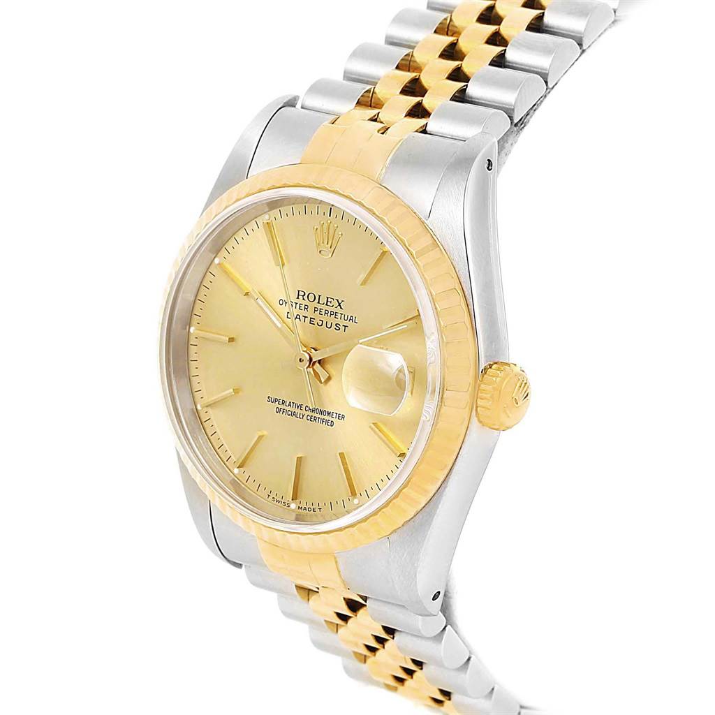 The Rolex Datejust 16233 Men's Steel and Gold (two tone) Champagne Dial 16233 Men's Steel and Gold (two tone) Champagne Dial watch is shown at a three-quarter angle, highlighting the dial, bezel, crown, and two-tone bracelet.