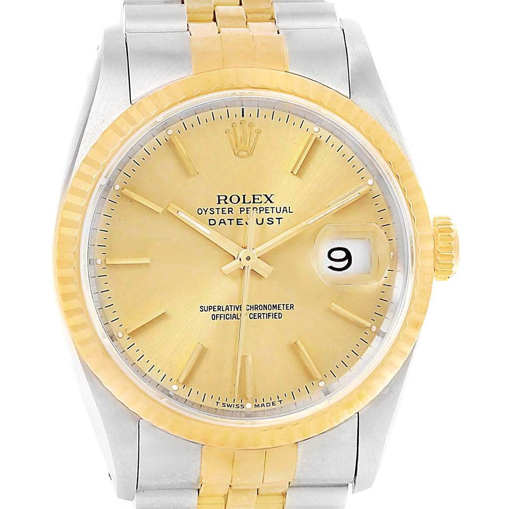 This image shows a close-up of the Rolex Datejust 16233 Men's Steel and Gold (two tone) Champagne Dial 16233 Men's Steel and Gold (two tone) Champagne Dial watch, highlighting the dial, bezel, crown, and part of the bracelet.