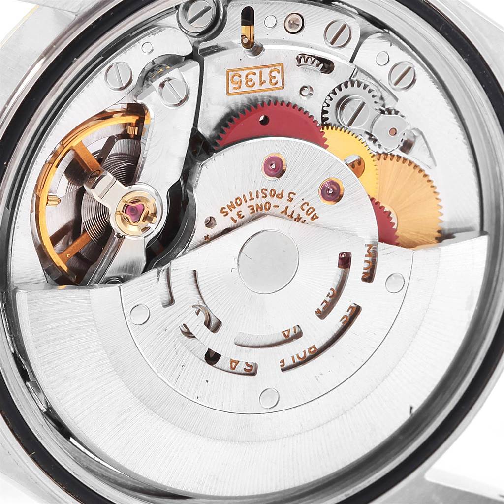 This image shows a close-up view of the internal mechanism of a Rolex Datejust 16233 Men's Steel and Gold (two tone) Champagne Dial 16233 Men's Steel and Gold (two tone) Champagne Dial watch.