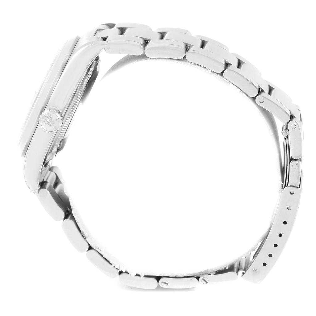 The image shows a side view of the Rolex Datejust 16200 Men's Stainless Steel Black Dial 16200 Men's Stainless Steel Black Dial watch, highlighting the bracelet and the winding crown.