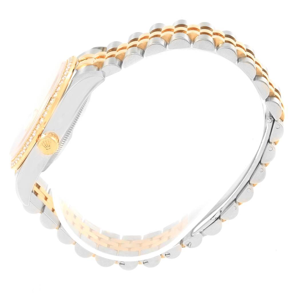 The image shows a side view of a Rolex Datejust 116243 Stainless Steel White Dial 116243 Stainless Steel White Dial watch, highlighting its crown, bezel, and two-tone bracelet.