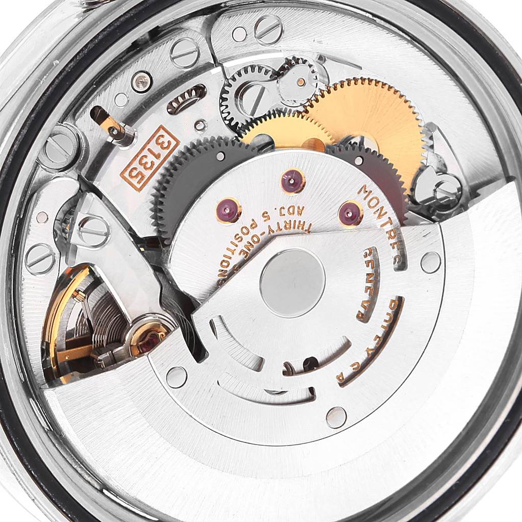 The image shows the inner movement mechanism of the Rolex Datejust 16234 Men's Stainless Steel White Dial 16234 Men's Stainless Steel White Dial watch, highlighting gears and rotating components.