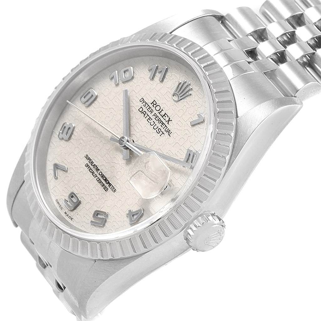 The image shows a close-up, angled view of the Rolex Datejust 16220 Men's Stainless Steel Silver Dial 16220 Men's Stainless Steel Silver Dial watch face, bezel, and part of the bracelet.