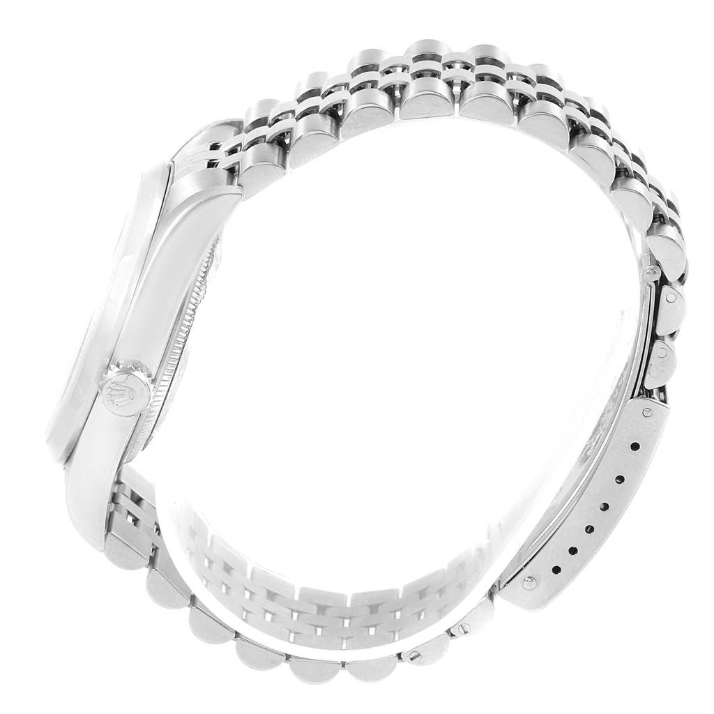 The image shows a side view of a Rolex Datejust 16200 Men's Stainless Steel Silver Dial 16200 Men's Stainless Steel Silver Dial model, highlighting its case, crown, and bracelet.