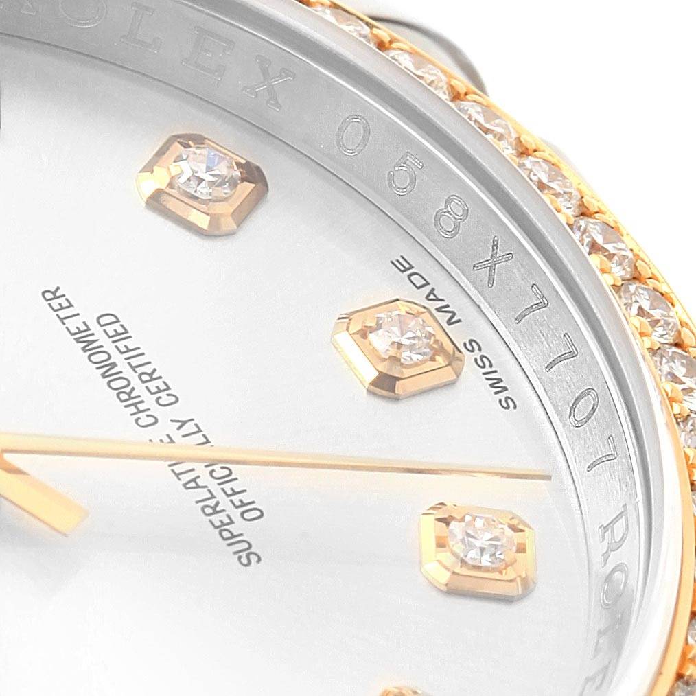 This close-up image shows the dial, diamond hour markers, bezel, and part of the serial number of the Rolex Datejust 116243 Stainless Steel Silver Dial 116243 Stainless Steel Silver Dial.
