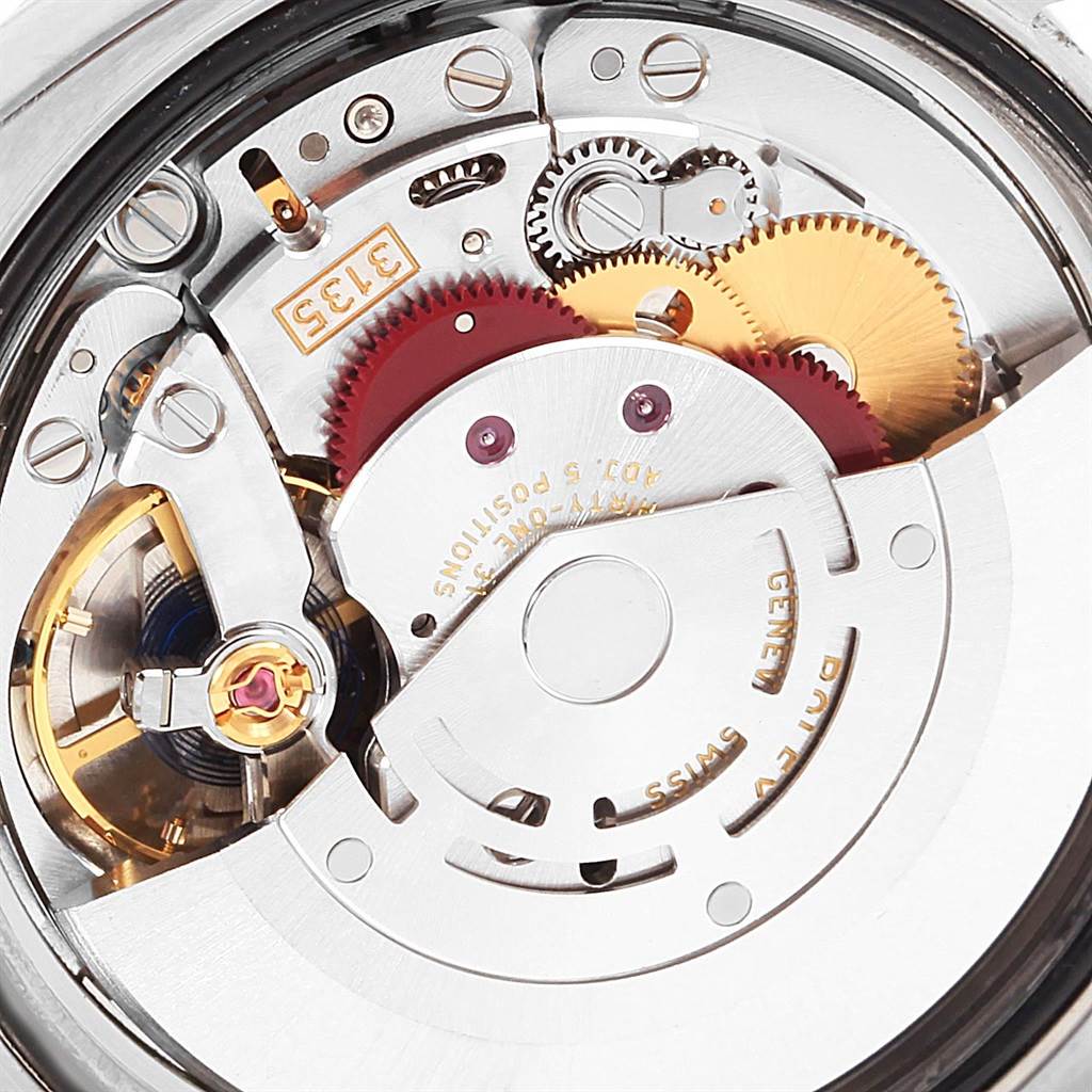 This is a close-up view showing the internal mechanism and gears of the Rolex Datejust 116243 Stainless Steel Silver Dial 116243 Stainless Steel Silver Dial watch.