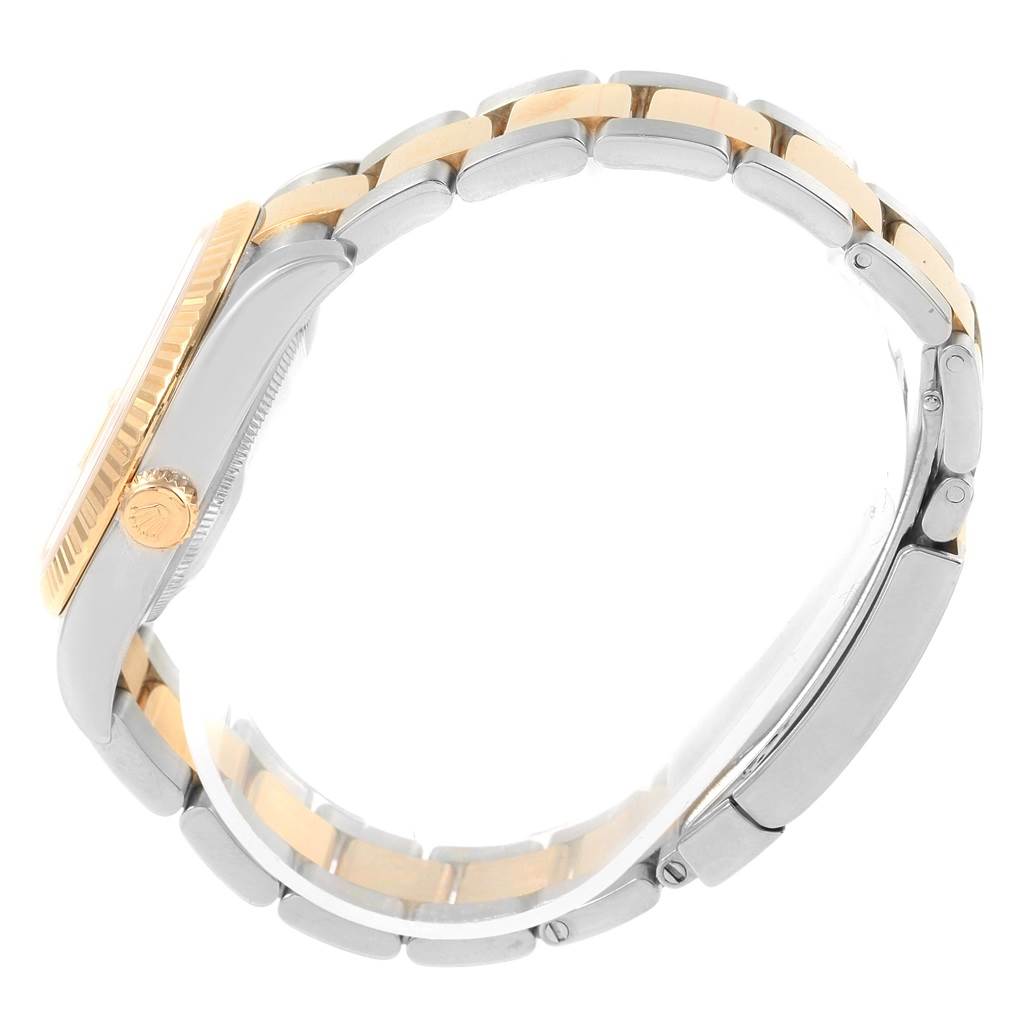 The image shows a side view of a Rolex Datejust 116233 Men's Stainless Steel Champagne Dial 116233 Men's Stainless Steel Champagne Dial watch, focusing on the bracelet, crown, and case.