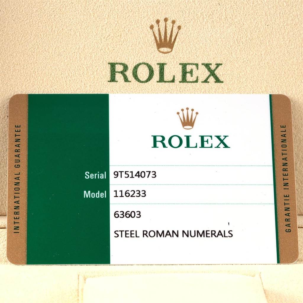 This image shows the serial and model number card for a Rolex Datejust 116233 Men's Stainless Steel Silver Dial 116233 Men's Stainless Steel Silver Dial model 116233 with steel Roman numerals.