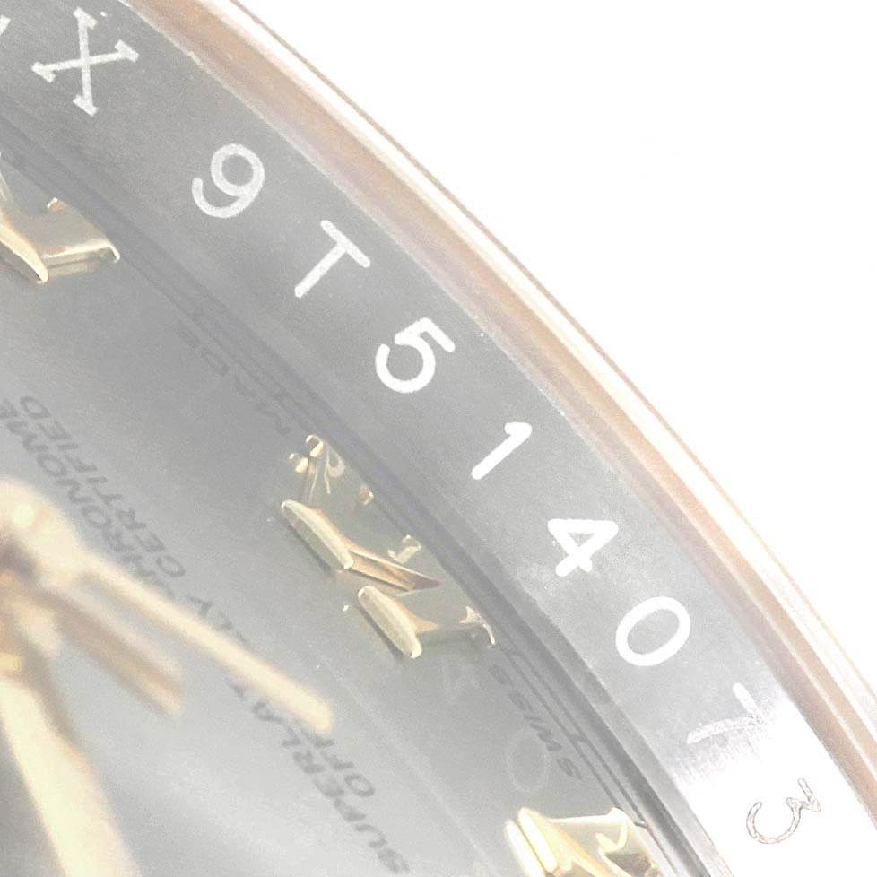 The image shows a close-up of the serial number and part of the dial with hour markers of a Rolex Datejust 116233 Men's Stainless Steel Silver Dial 116233 Men's Stainless Steel Silver Dial watch.