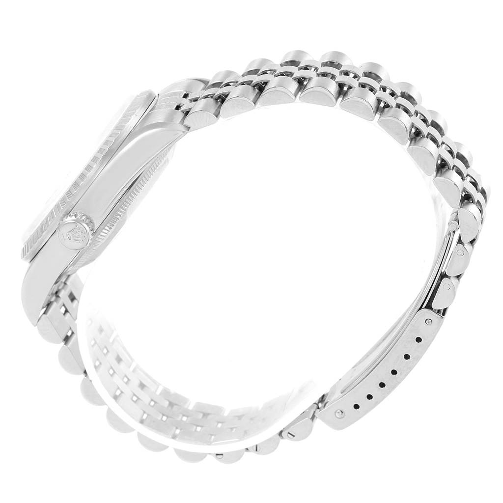 The image shows a side view of a Rolex Datejust 16220 Men's Stainless Steel Silver Dial 16220 Men's Stainless Steel Silver Dial watch, highlighting the crown, case, and the Jubilee bracelet.