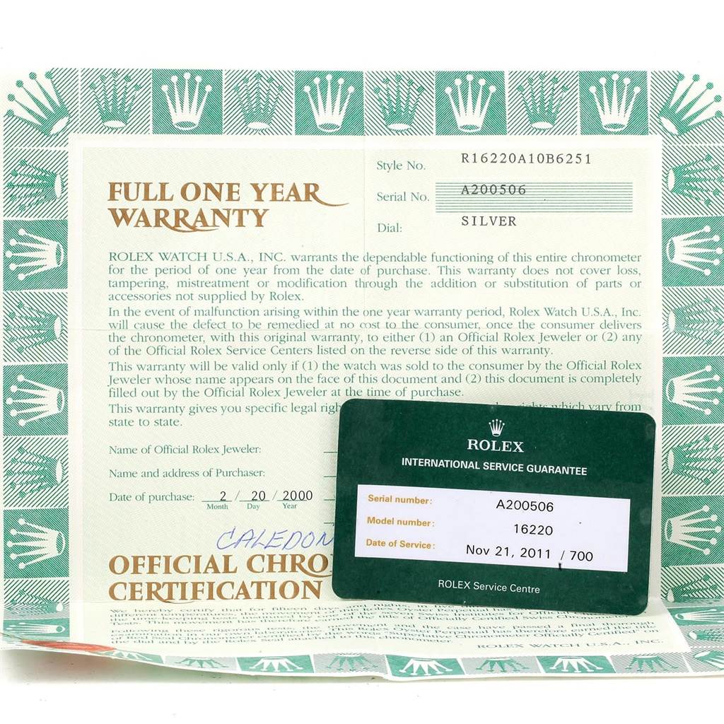 This image shows the warranty and certification documents for a Rolex Datejust 16220 Men's Stainless Steel Silver Dial 16220 Men's Stainless Steel Silver Dial model watch.