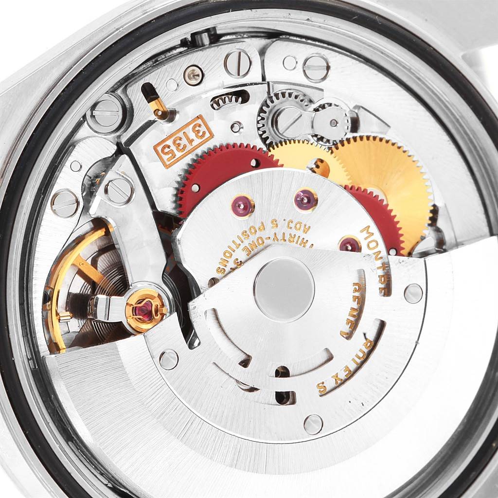 This close-up image shows the intricate internal movement mechanism of a Rolex Datejust 16220 Men's Stainless Steel Silver Dial 16220 Men's Stainless Steel Silver Dial watch.
