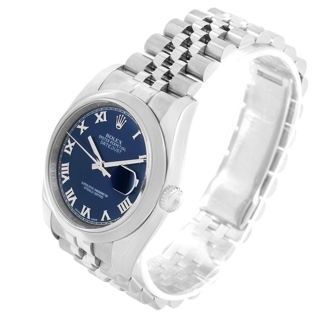 The image shows a Rolex Datejust 116200 Men's Stainless Steel Blue Dial 116200 Men's Stainless Steel Blue Dial watch at an oblique angle, highlighting its blue dial, Roman numerals, and stainless steel Jubilee bracelet.
