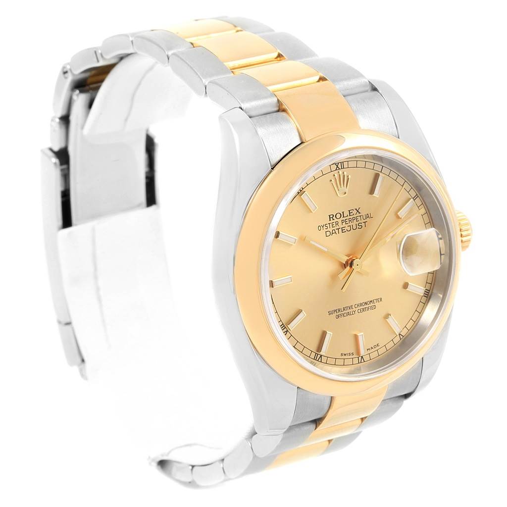 The image shows a Rolex Datejust 116203 Men
s Stainless Steel Champagne Dial 116203 Men
s Stainless Steel Champagne Dial watch featuring a gold dial and a two-tone gold and silver bracelet at a side angle.