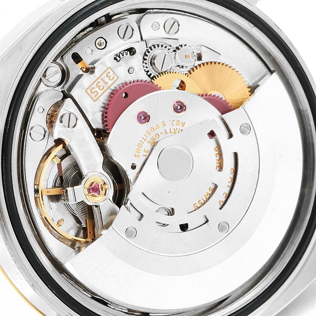 This image shows the intricate internal mechanism of the Rolex Datejust 116203 Men
s Stainless Steel Champagne Dial 116203 Men
s Stainless Steel Champagne Dial watch, highlighting gears and components.