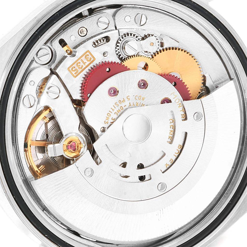 The image shows the movement mechanism of the Rolex Datejust 16200 Men's Stainless Steel Blue Dial 16200 Men's Stainless Steel Blue Dial watch from a back view.