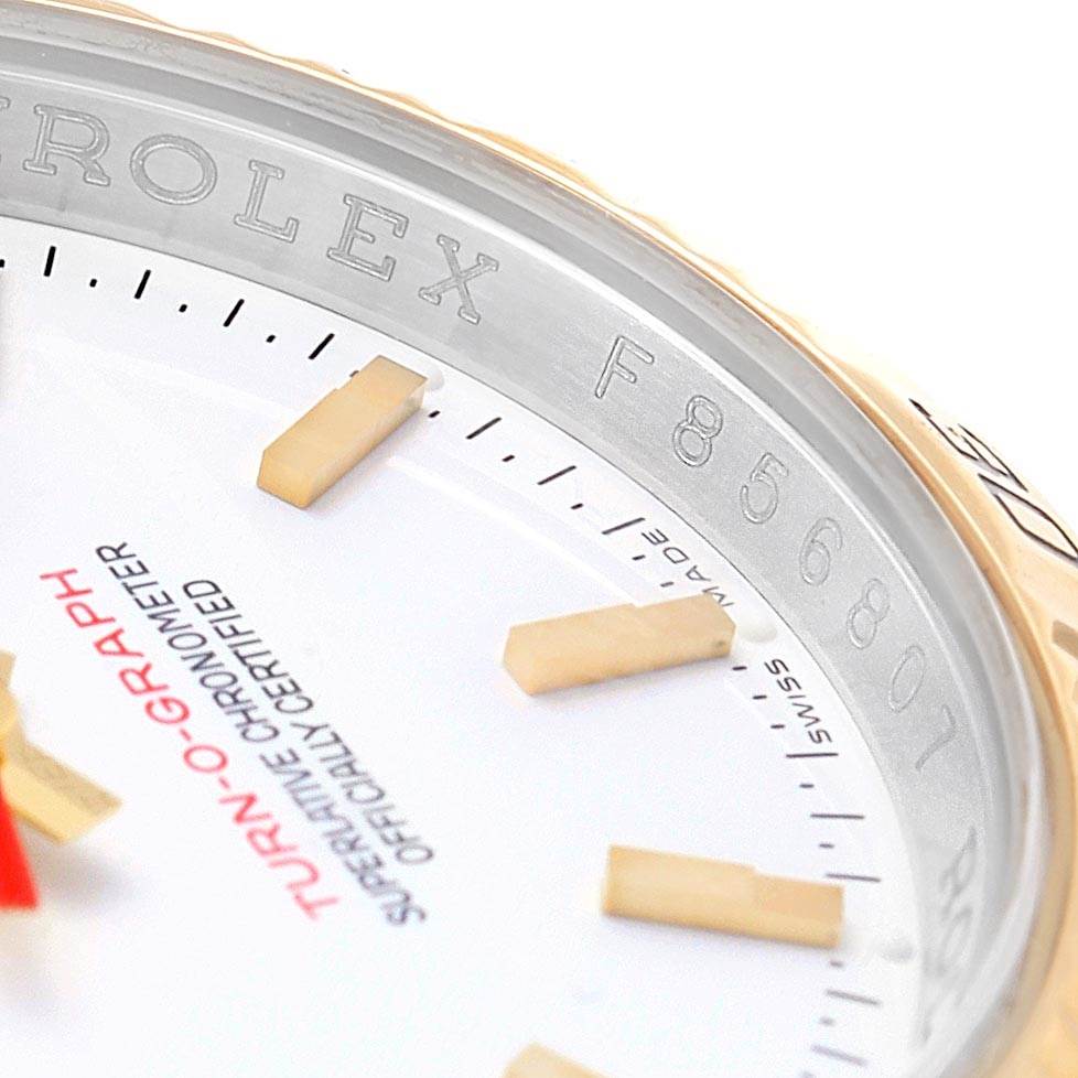 The image shows a close-up of the dial and part of the bezel of a Rolex Datejust 116263 Men's Stainless Steel White Dial 116263 Men's Stainless Steel White Dial, including hour markers and the "TURN-O-GRAPH" text.