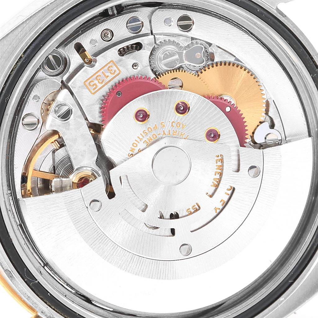 The image shows the internal mechanism and movement parts of a Rolex Datejust 116263 Men's Stainless Steel White Dial 116263 Men's Stainless Steel White Dial watch from a close-up angle.