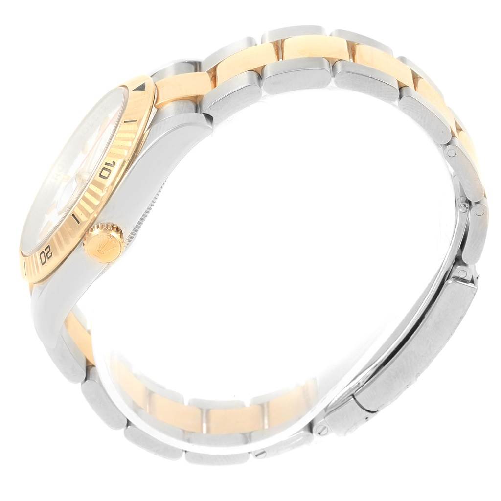 This image shows a side view of a Rolex Datejust 116263 Men's Stainless Steel White Dial 116263 Men's Stainless Steel White Dial watch, highlighting its two-tone bracelet and the crown.