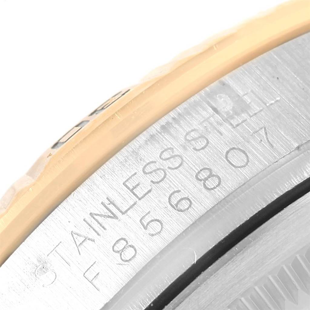 This close-up image shows the stainless steel case back of a Rolex Datejust 116263 Men's Stainless Steel White Dial 116263 Men's Stainless Steel White Dial watch.