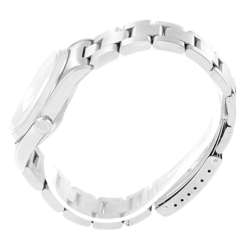 This image shows a side view of the Rolex Datejust 16200 Men's Stainless Steel Blue Dial 16200 Men's Stainless Steel Blue Dial watch, highlighting its bracelet and partially visible case.