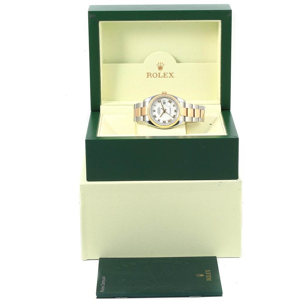 The image shows a Rolex Datejust 116233 Men's Stainless Steel White Dial 116233 Men's Stainless Steel White Dial watch in its open green and cream box with a card or booklet placed below.