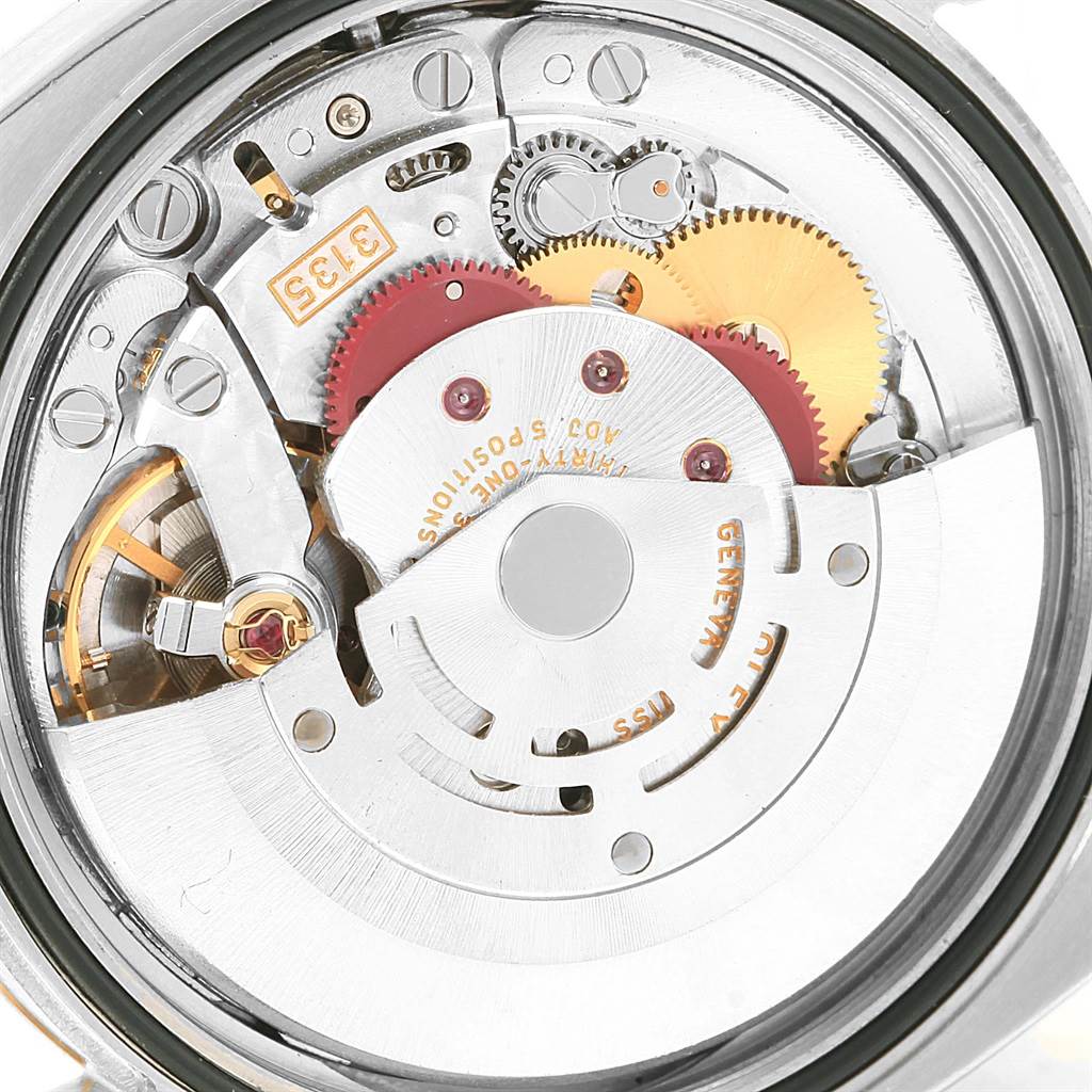 This image shows a close-up of the inner mechanical movement of a Rolex Datejust 116233 Men's Stainless Steel White Dial 116233 Men's Stainless Steel White Dial watch.