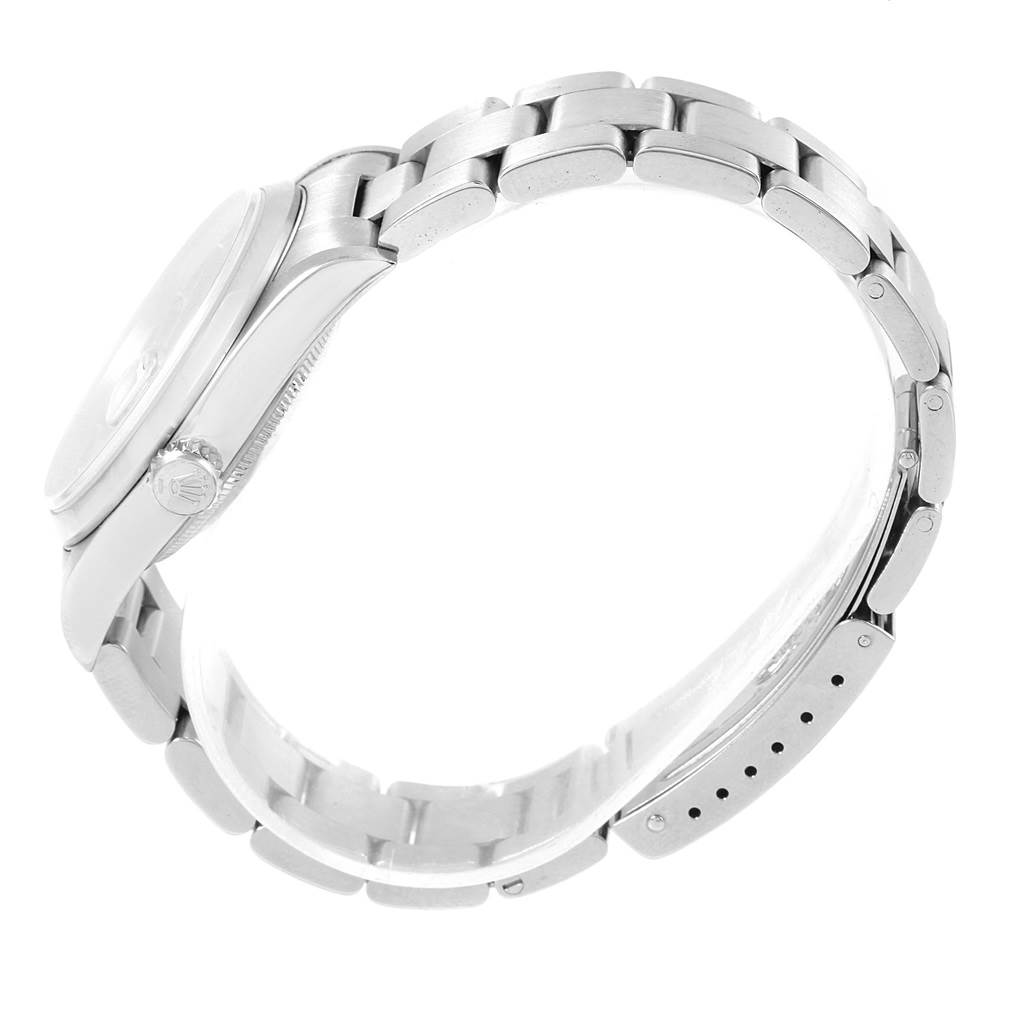 The image shows a side view of a Rolex Datejust 16200 Men's Stainless Steel Black Dial 16200 Men's Stainless Steel Black Dial's case and bracelet with the crown visible.