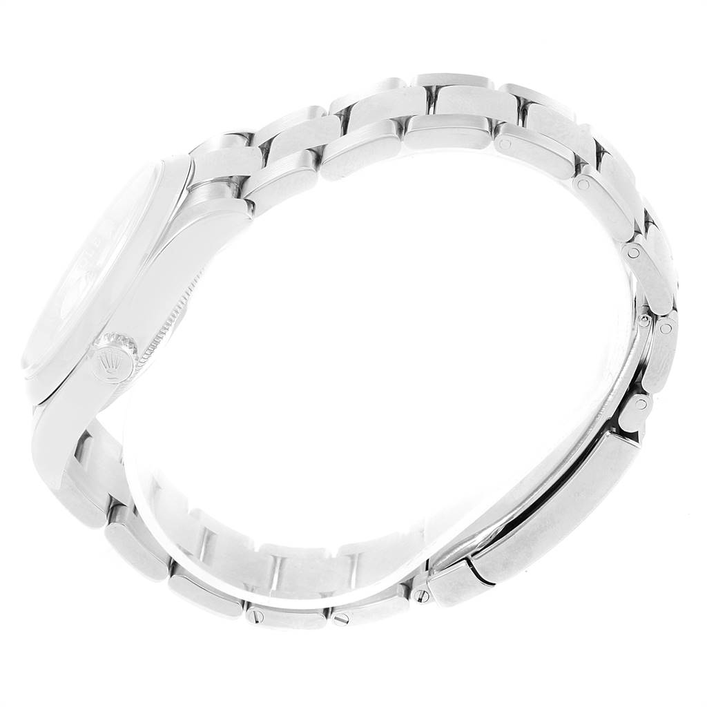 The image shows a side view of the Rolex Datejust 116200 Men's Stainless Steel White Dial 116200 Men's Stainless Steel White Dial, highlighting its bracelet and case.