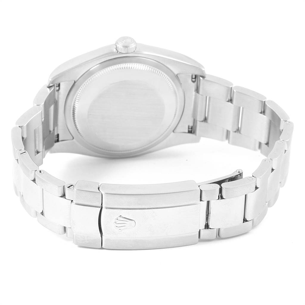 The image shows the back and bracelet of a Rolex Datejust 116200 Men's Stainless Steel White Dial 116200 Men's Stainless Steel White Dial watch, highlighting the clasp with the Rolex logo.
