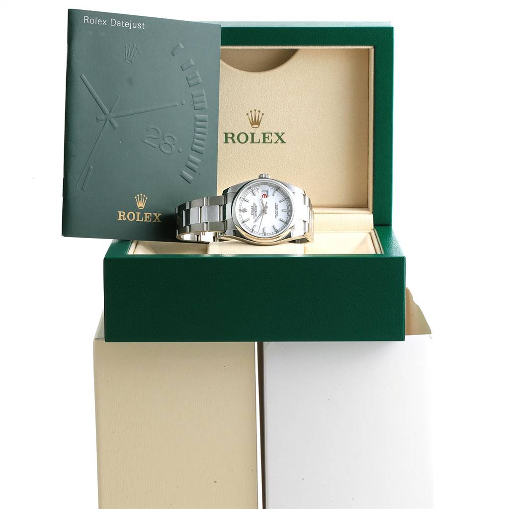 The Rolex Datejust 116200 Men's Stainless Steel White Dial 116200 Men's Stainless Steel White Dial model watch is displayed in its open box with its booklet beside it.