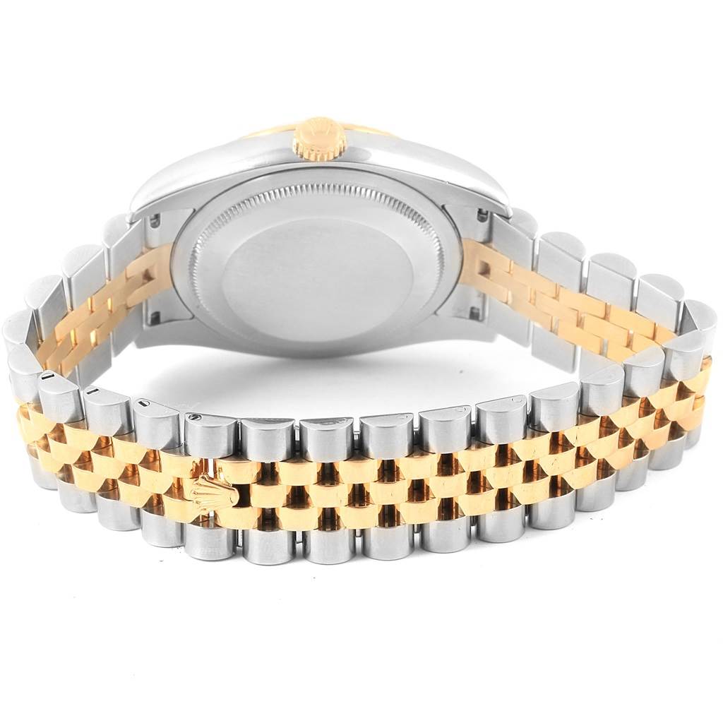 The image shows the back view of a Rolex Datejust 116233 Stainless Steel Mother of Pearl Dial 116233 Stainless Steel Mother of Pearl Dial watch, highlighting its two-tone bracelet and case back.