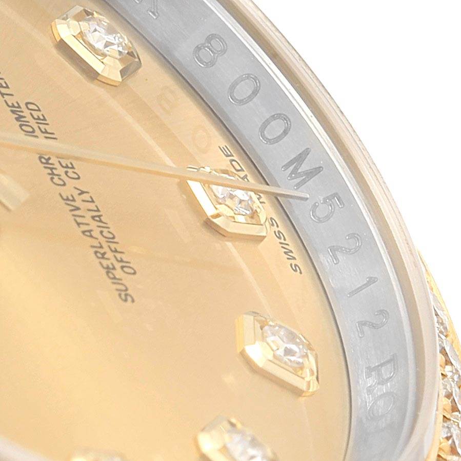 The image shows a close-up of the dial and bezel, highlighting diamond markers and part of the serial number of the Rolex Datejust 116243 Women's Stainless Steel Champagne Dial 116243 Women's Stainless Steel Champagne Dial watch.