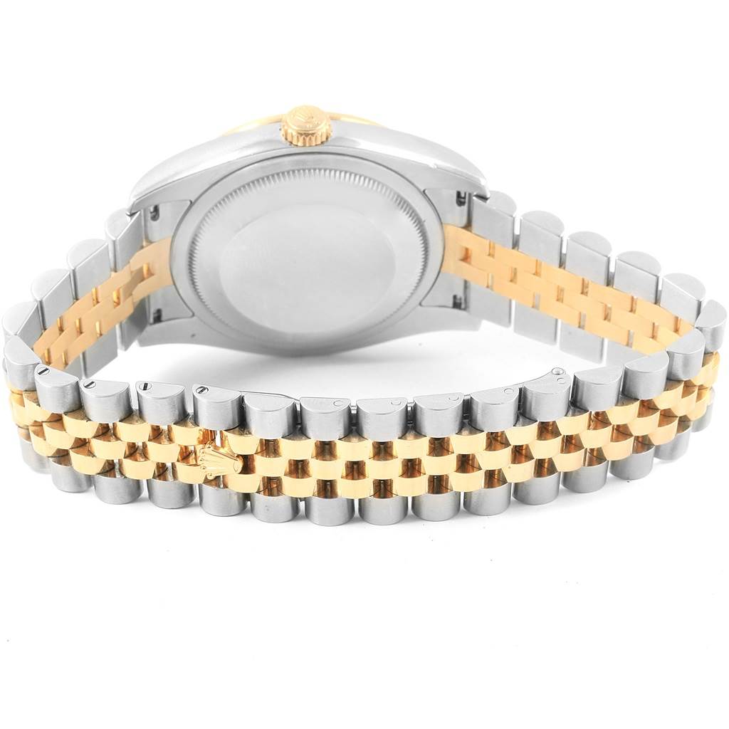 The image shows the back case and stainless steel and gold bracelet of a Rolex Datejust 116243 Women's Stainless Steel Champagne Dial 116243 Women's Stainless Steel Champagne Dial watch.