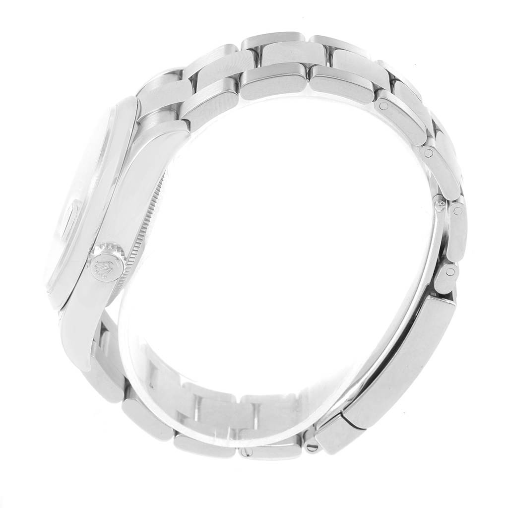 The image shows a side view of the Rolex Datejust 116200 Men's Stainless Steel Blue Dial 116200 Men's Stainless Steel Blue Dial watch, highlighting its case, crown, and bracelet.