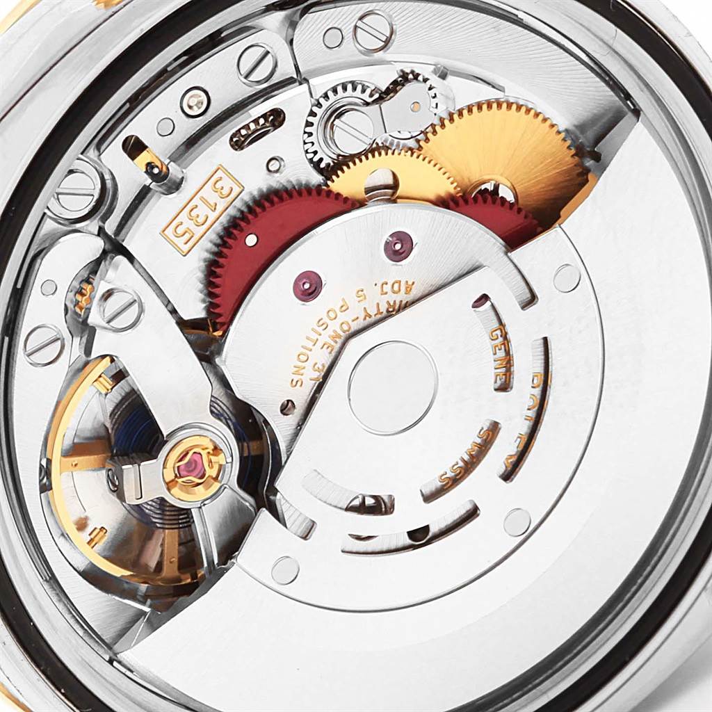 This image shows the internal movement and components of a Rolex Datejust 116243 Men's Stainless Steel Mother of Pearl Dial 116243 Men's Stainless Steel Mother of Pearl Dial watch at a close-up angle.