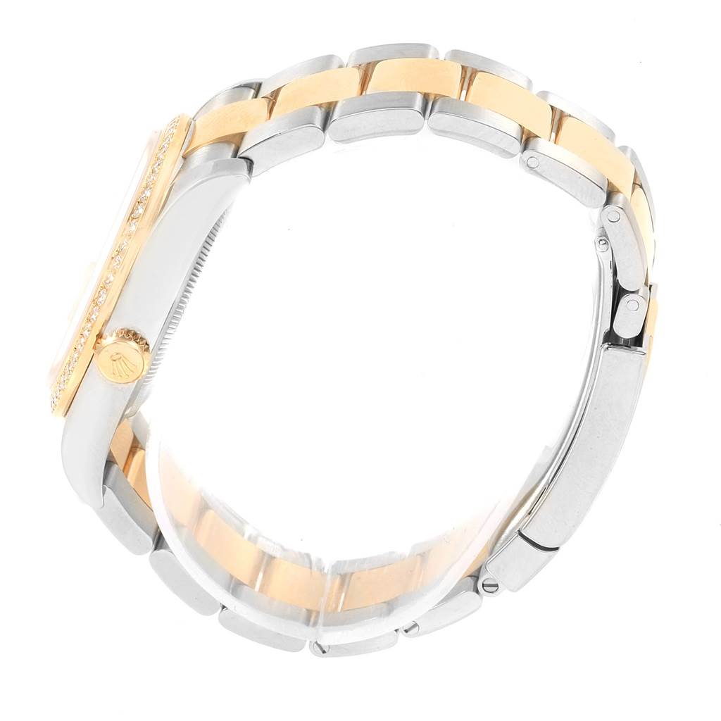 The image shows a side view of a Rolex Datejust 116243 Men's Stainless Steel Mother of Pearl Dial 116243 Men's Stainless Steel Mother of Pearl Dial watch highlighting its bezel, crown, and two-tone bracelet.