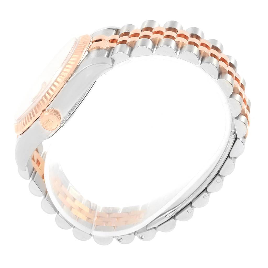 The image shows the side view of a Rolex Datejust 116231 Steel and Gold (two tone) Pink Dial 116231 Steel and Gold (two tone) Pink Dial watch, focusing on its two-tone bracelet and crown.