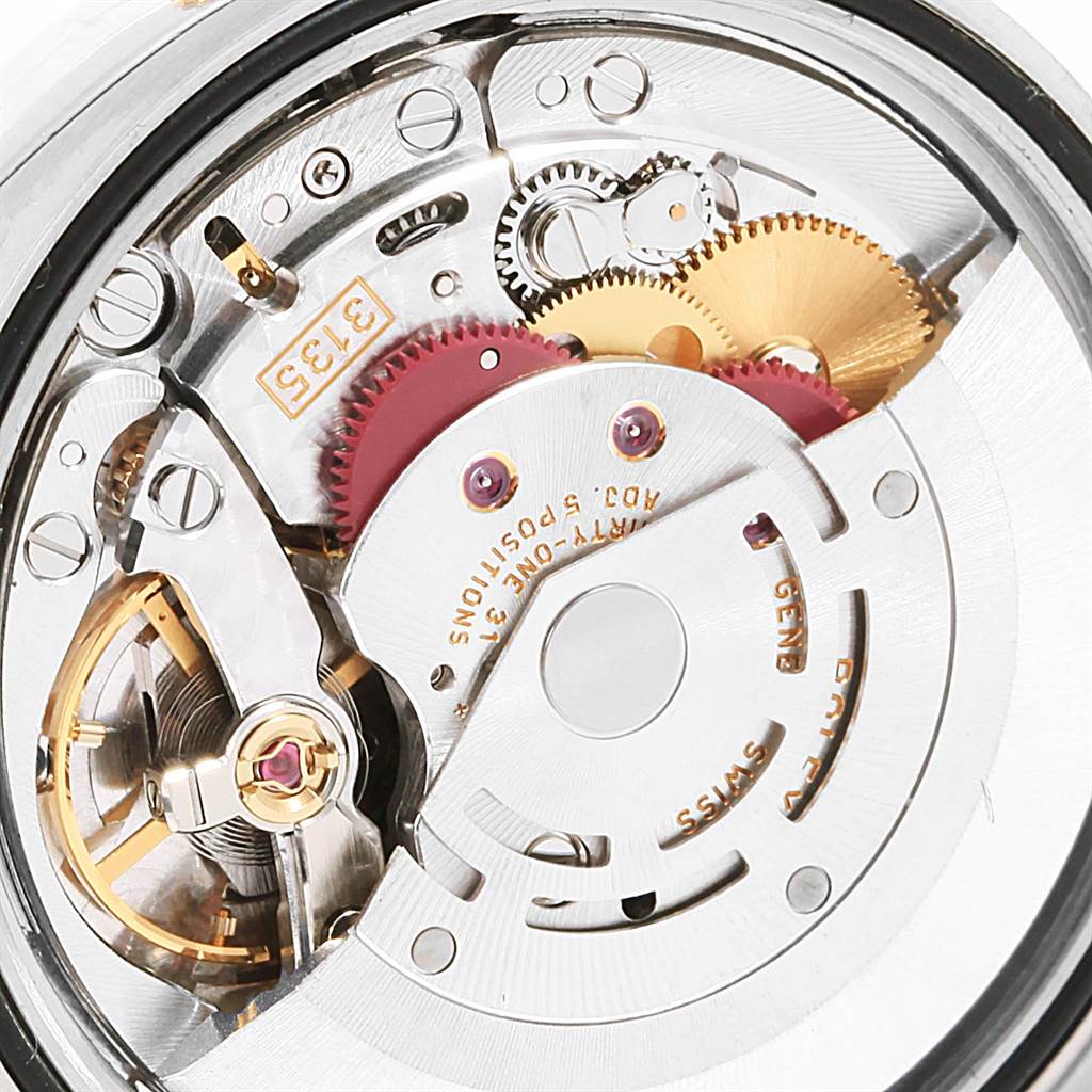 This image shows an up-close view of the movement and internal components of a Rolex Datejust 116203 Men's Steel and Gold (two tone) Black Dial 116203 Men's Steel and Gold (two tone) Black Dial model watch.