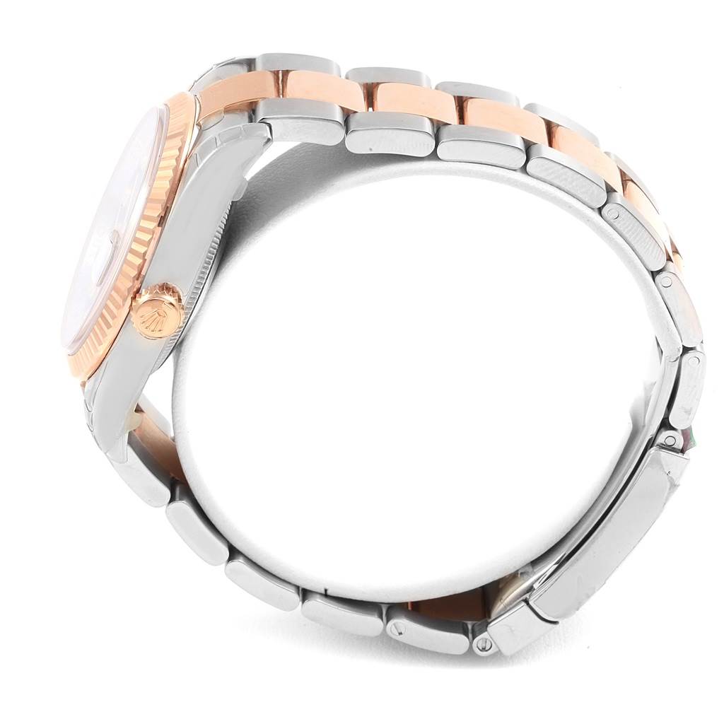 The image shows a side view of a Rolex Datejust 116231 Men's Steel and Gold (two tone) Black Dial 116231 Men's Steel and Gold (two tone) Black Dial watch, highlighting the crown, case, and two-tone bracelet.