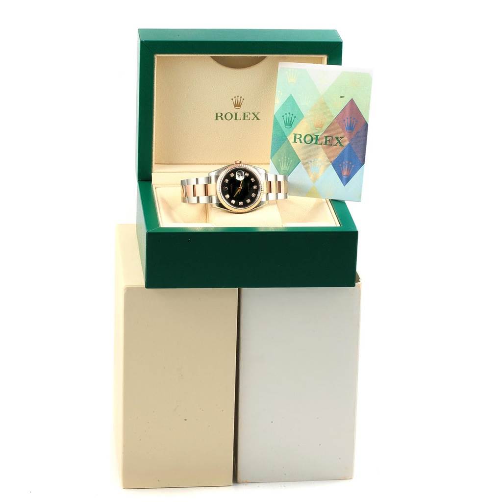 The image shows a Rolex Datejust 116231 Men's Steel and Gold (two tone) Black Dial 116231 Men's Steel and Gold (two tone) Black Dial watch in its open box with accompanying documentation displayed at a front angle.