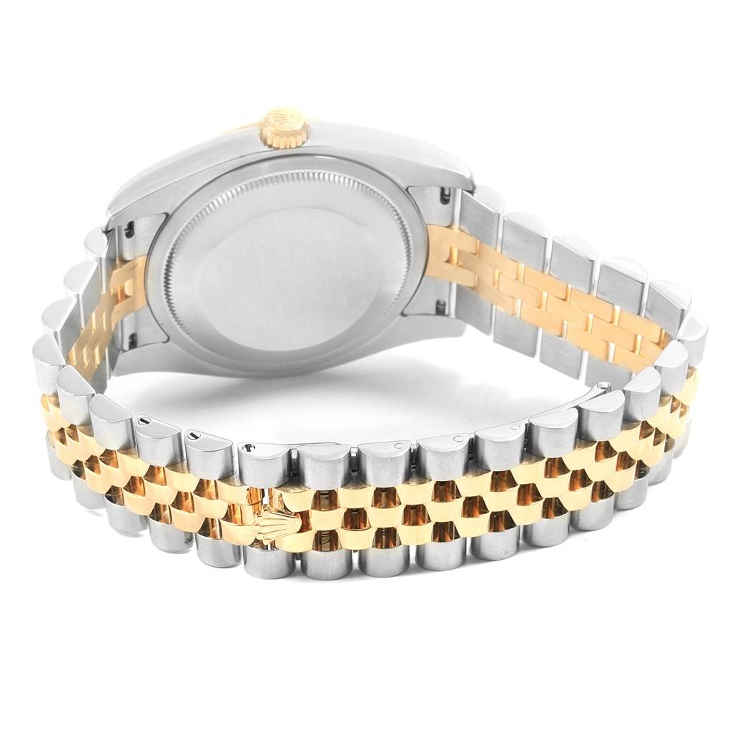 The image shows the back of a Rolex Datejust 116233 Men's Stainless Steel Black Dial 116233 Men's Stainless Steel Black Dial watch with its distinctive two-tone jubilee bracelet.