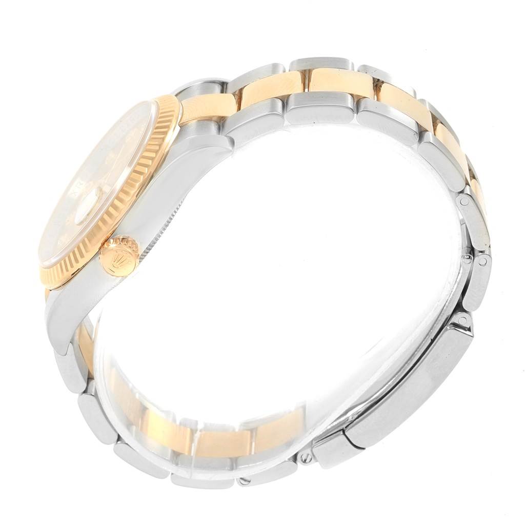 The image shows a side profile of the Rolex Datejust 116233 Men's Stainless Steel Champagne Dial 116233 Men's Stainless Steel Champagne Dial watch, highlighting its bezel, crown, and two-tone bracelet.