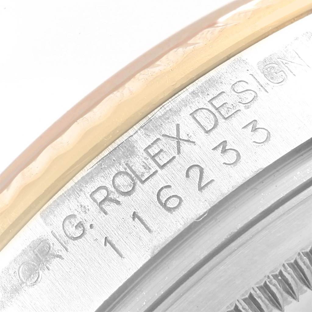 The image shows a close-up of the model number engraving on the side of the bezel of a Rolex Datejust 116233 Men's Stainless Steel Champagne Dial 116233 Men's Stainless Steel Champagne Dial watch.