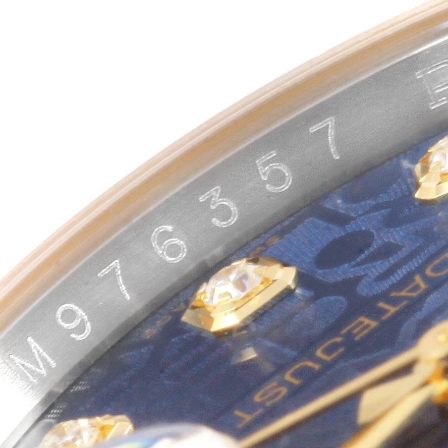 This image shows a close-up angle of the serial number and dial on a Rolex Datejust 116233 Men's Stainless Steel Blue Dial 116233 Men's Stainless Steel Blue Dial watch.