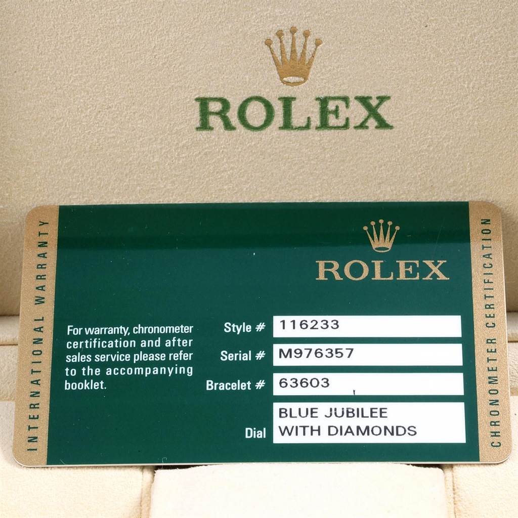This image shows the warranty card for the Rolex Datejust 116233 Men's Stainless Steel Blue Dial 116233 Men's Stainless Steel Blue Dial model 116233, including serial and bracelet numbers, with a blue jubilee dial with diamonds.