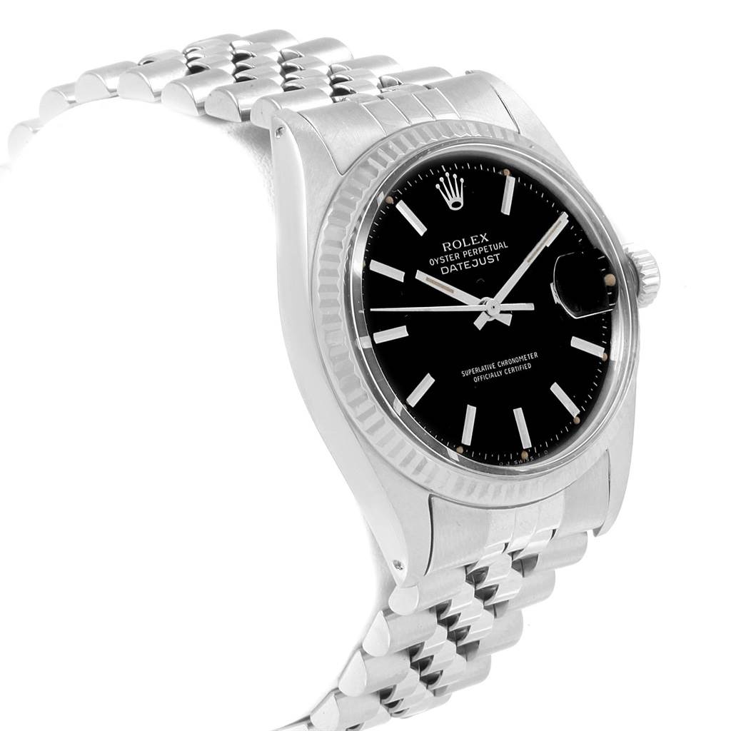 This image shows a Rolex Datejust 1601 Men's Stainless Steel Black Dial 1601 Men's Stainless Steel Black Dial watch from a three-quarter angle, highlighting its black dial, fluted bezel, and jubilee bracelet.