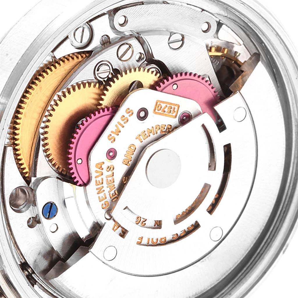 The image shows the internal mechanism of a Rolex Datejust 1601 Men's Stainless Steel Black Dial 1601 Men's Stainless Steel Black Dial watch at a close-up angle, highlighting gears and components.
